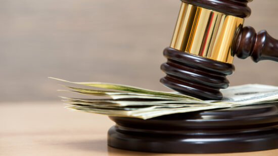 gavel on a money