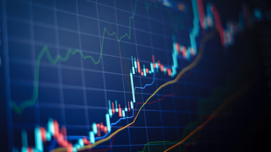 Closeup financial chart with uptrend line candlestick graph in s
