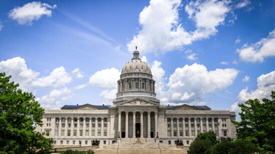 Mesmerizing Missouri State Capitol building with the courtyard under the blue sky in Jefferson City